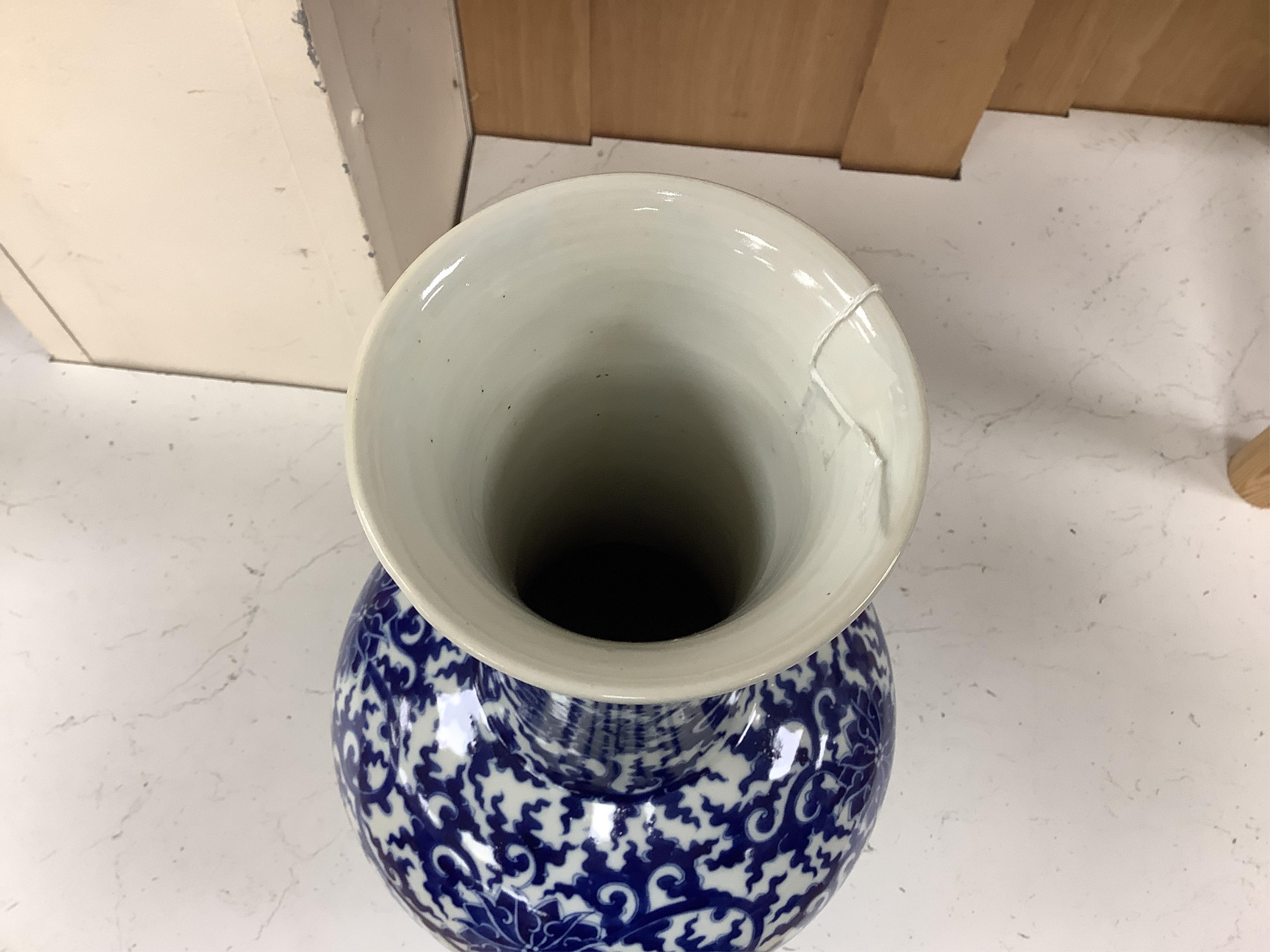 A large Chinese blue and white vase, 42cm high. Condition - good